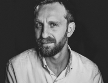 Black-and-white headshot of Dan Hammer